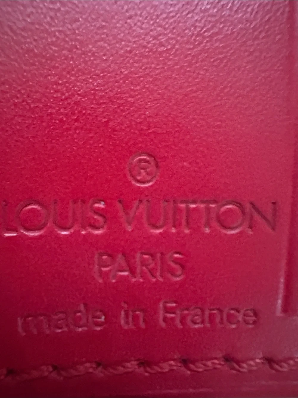 Louis Vuitton Bright Red TIAGA Leather Tag